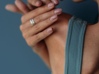 Close-up of a controlled yoga pose showing muscle engagement.